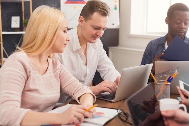 A group of teachers participating in a professional development workshop, learning about data analysis tools and personalized instruction techniques. The focus is on collaborative learning and practical application.