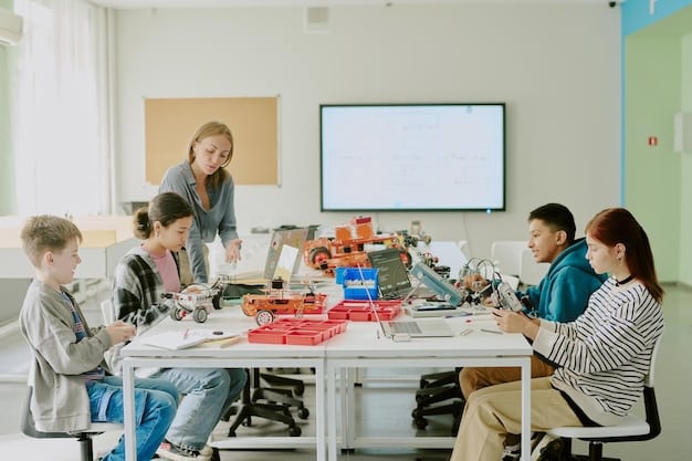 A group of students gathered around an interactive whiteboard, collaboratively working on a science project. The teacher is facilitating the discussion, guiding them through the experiment displayed on the board.