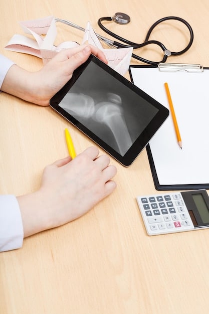 A person using a calculator and reviewing documents with financial charts on a desk. The scene conveys the importance of budgeting and financial planning for healthcare expenses.