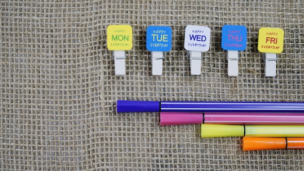 A calendar marking the open enrollment period with a highlighter, surrounded by brochures about different benefits like health insurance, dental plans, and retirement savings. The scene is organized and informative.