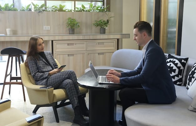 A friendly EAP counselor sitting across from an employee in a comfortable office setting, listening attentively. The image conveys a sense of empathy and support, emphasizing the confidential nature of EAP sessions.